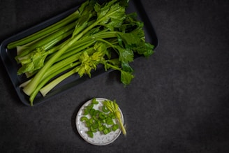a bunch of celery sitting on top of a table