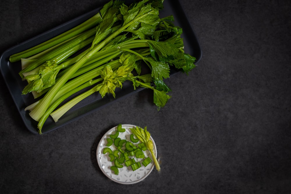 a bunch of celery sitting on top of a table