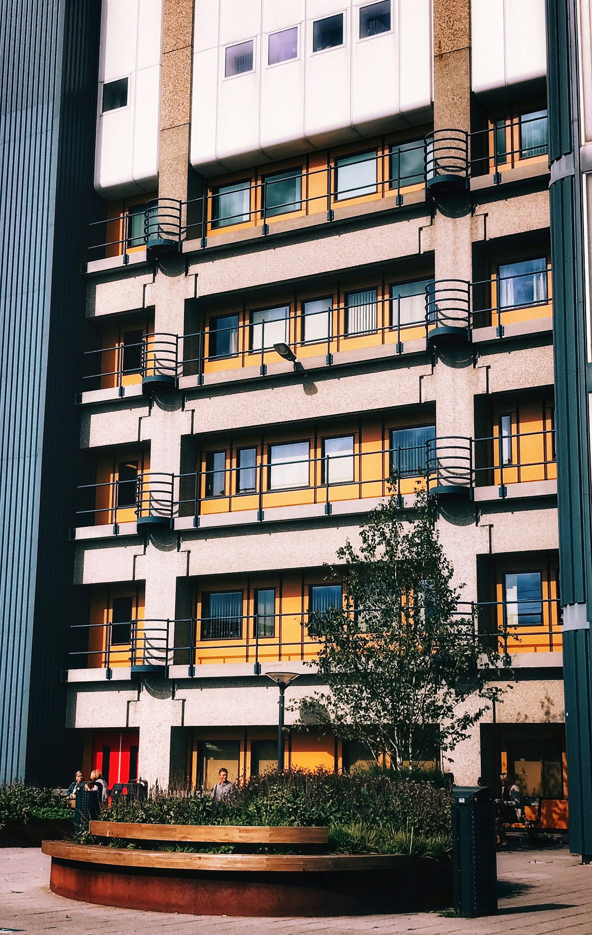 a tall building with balconies and balconies on it