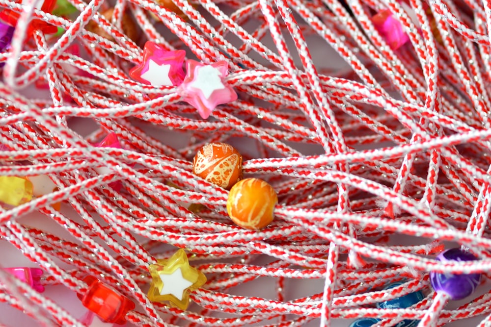 a close up of a bunch of candy on a string