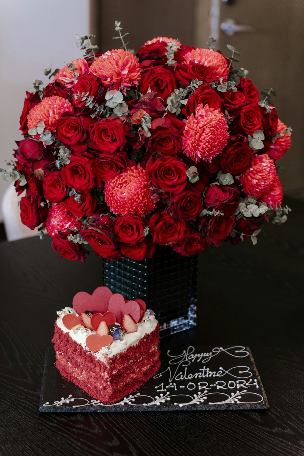 a heart shaped cake sitting on top of a table