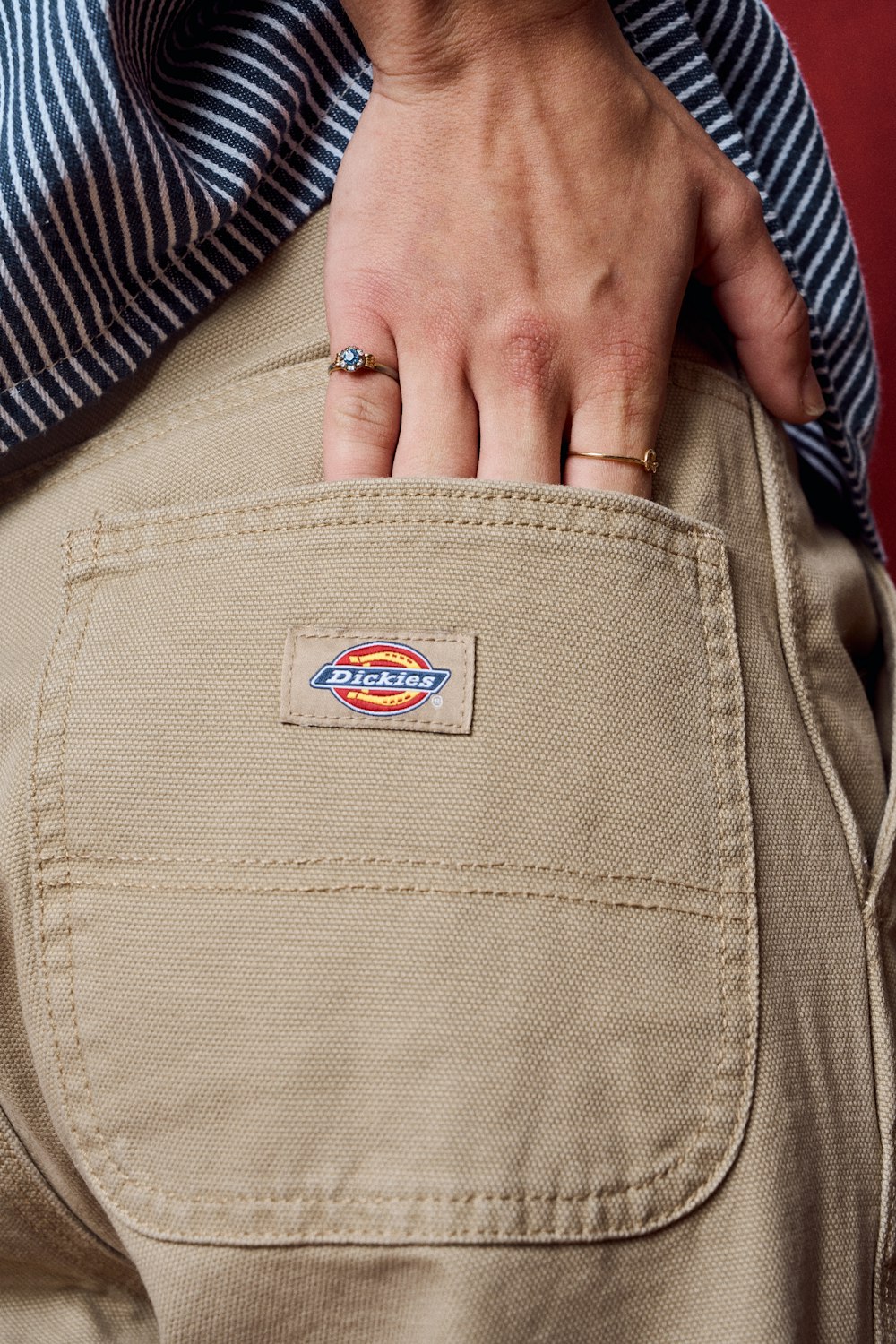 a close up of a person's pants with a badge on it