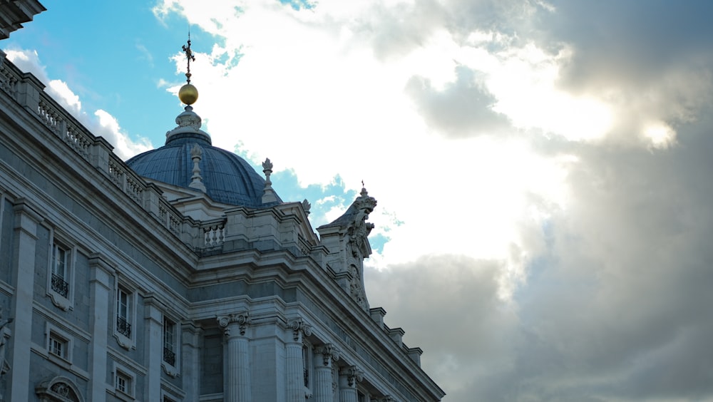 a large building with a blue dome on top