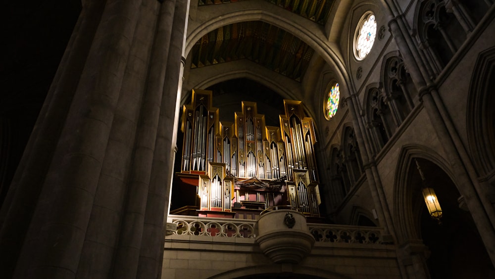 a cathedral with a pipe organ in the middle of it