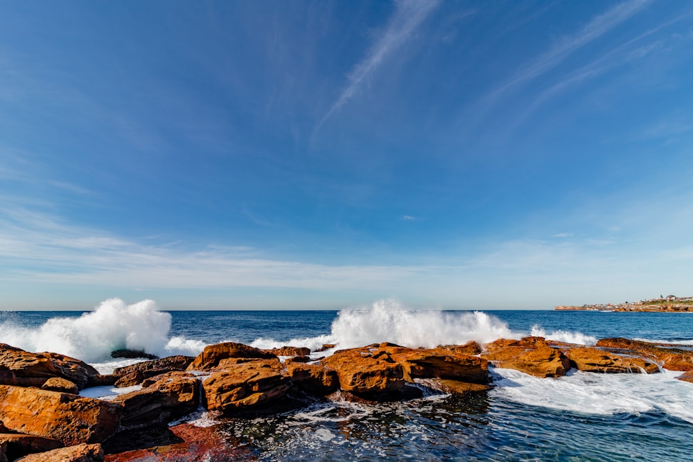 a large body of water surrounded by rocks