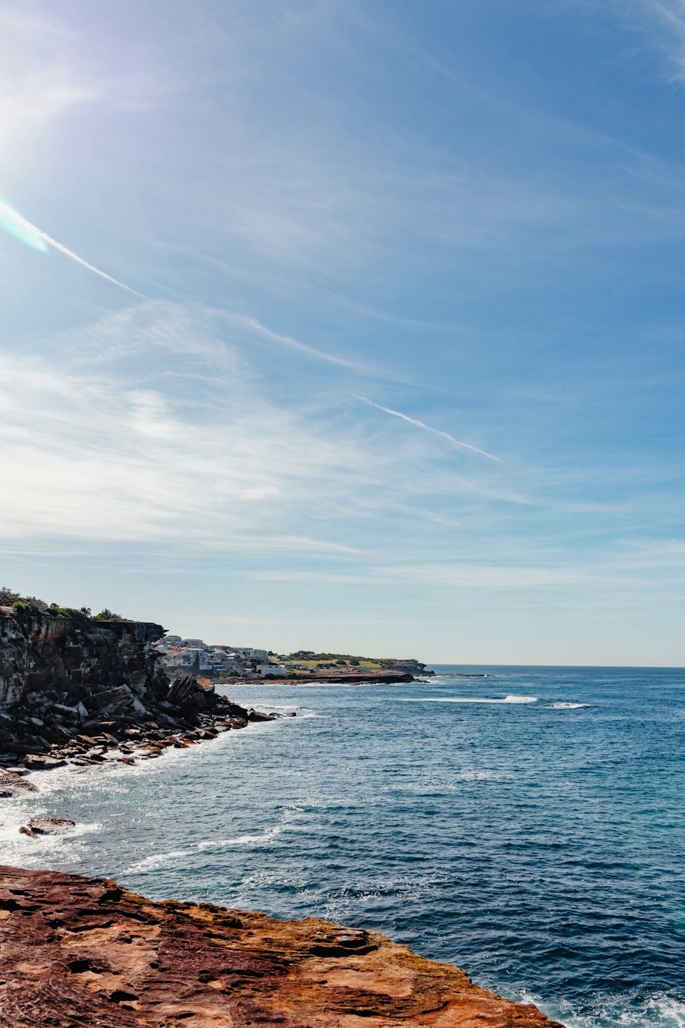 a view of a body of water from a cliff