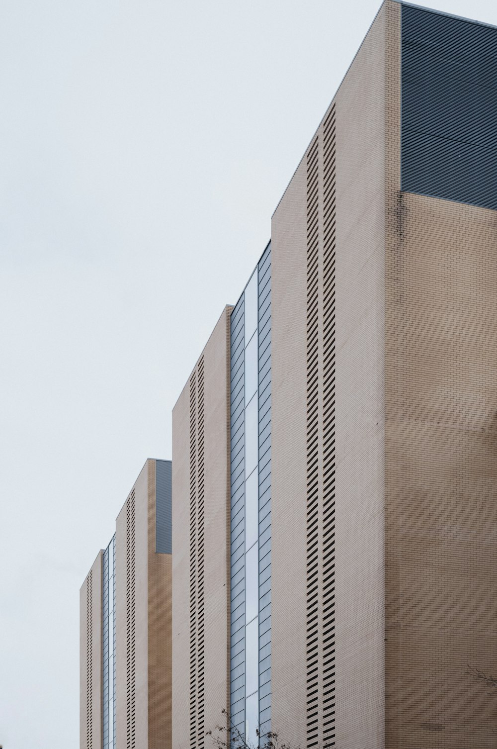 a tall building with a clock on the side of it