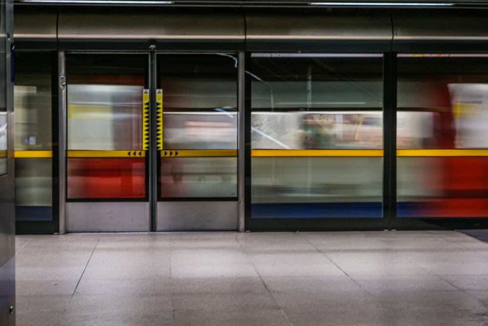 a train is passing by a train station