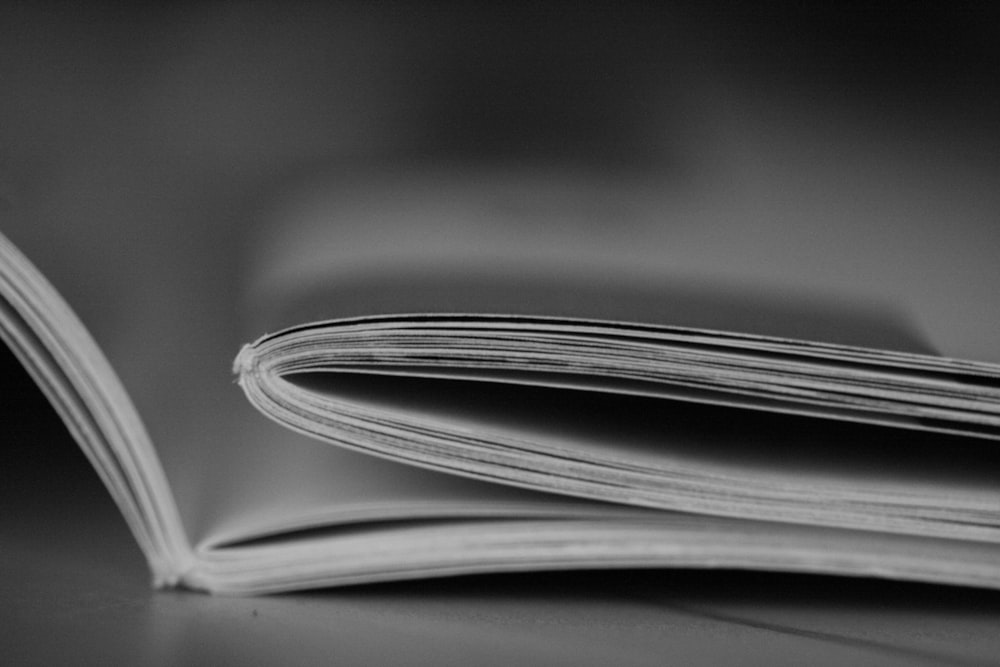 an open book sitting on top of a table