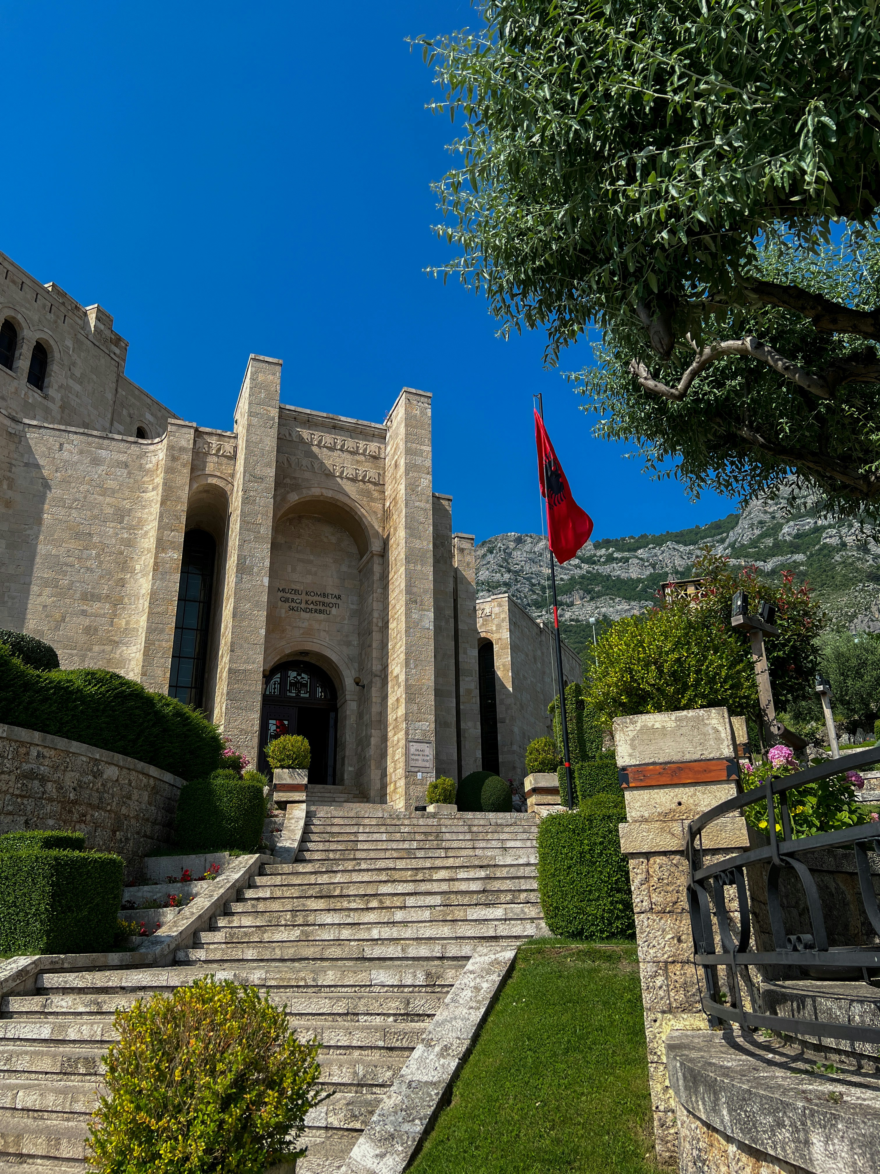a stone building with steps leading up to it