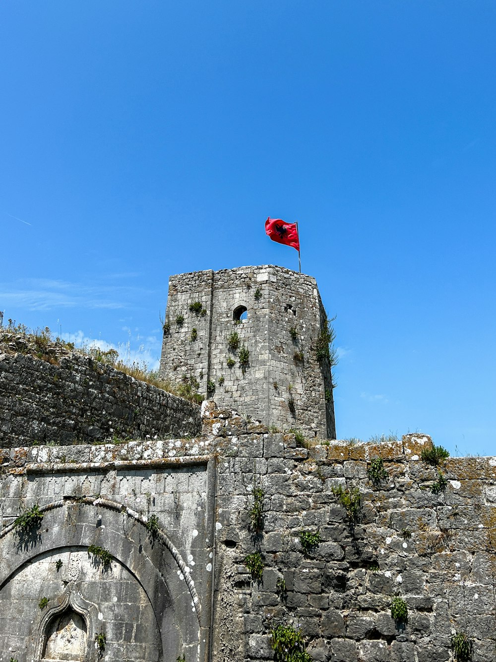 a castle with a flag on top of it