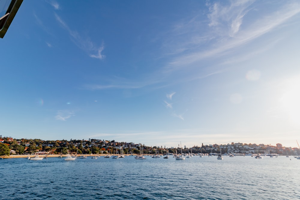 a body of water with boats floating on top of it