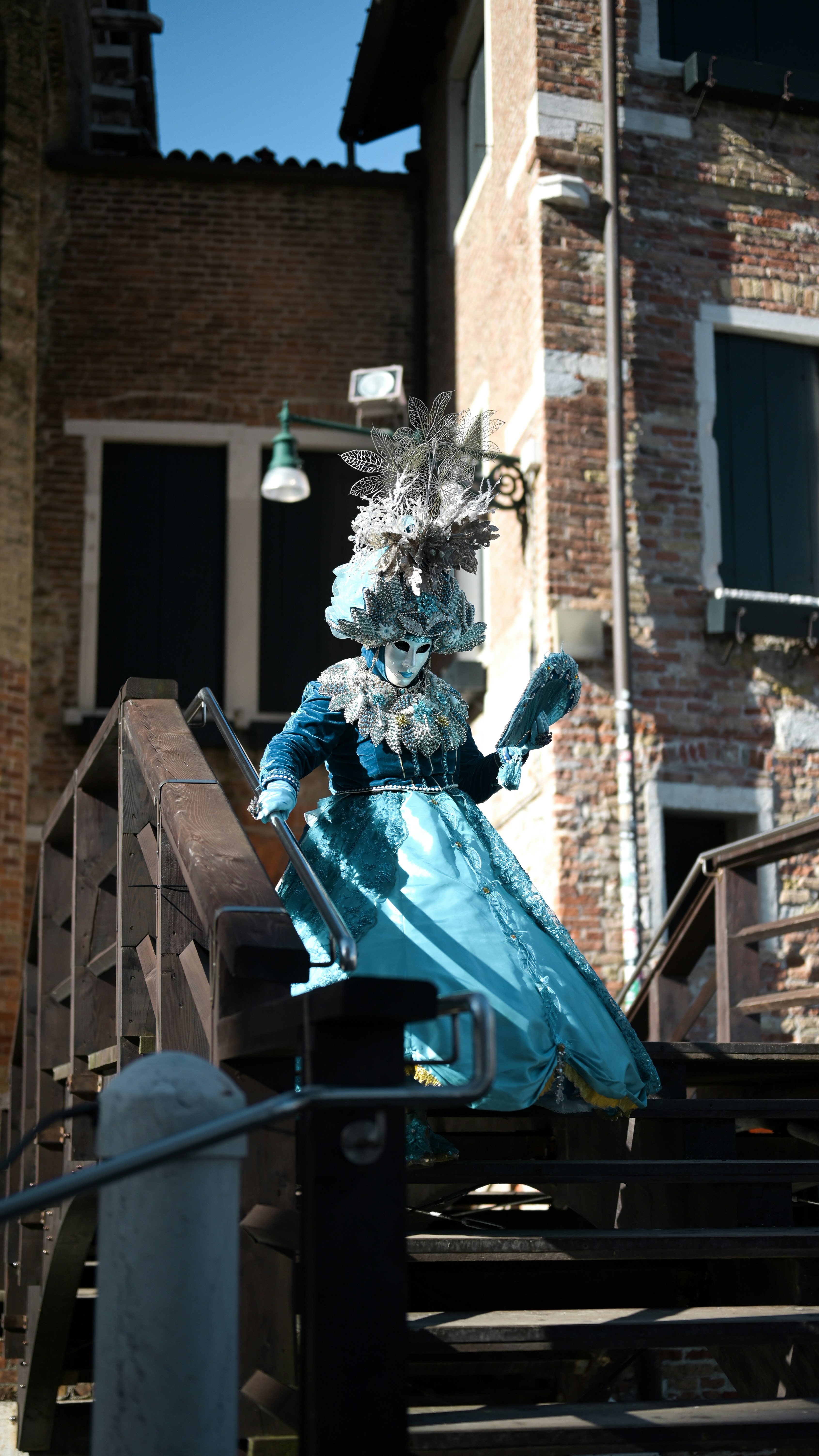 A statue of a woman in a blue dress photo – Free Handrail Image on Unsplash
