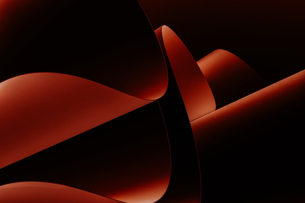 a black and red background with a curved design