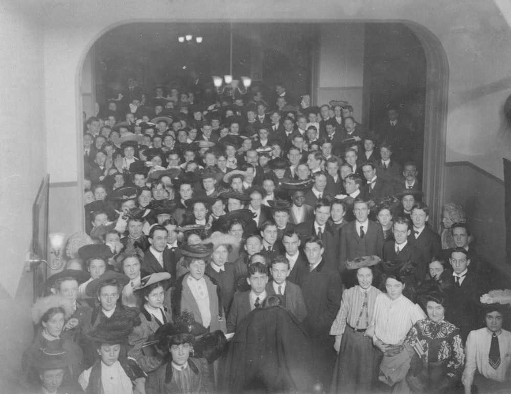 a large group of people are posing for a picture
