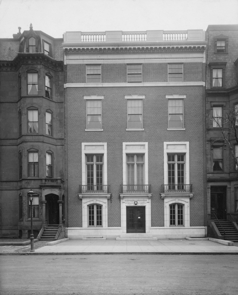 an old black and white photo of a building