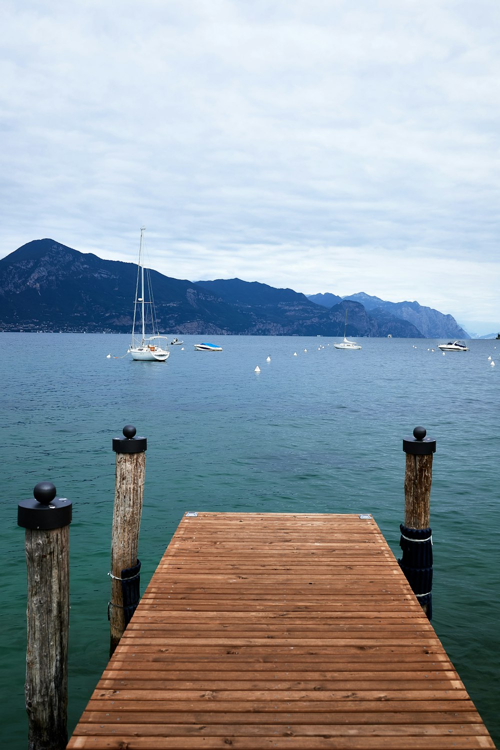 a wooden dock sitting on top of a body of water