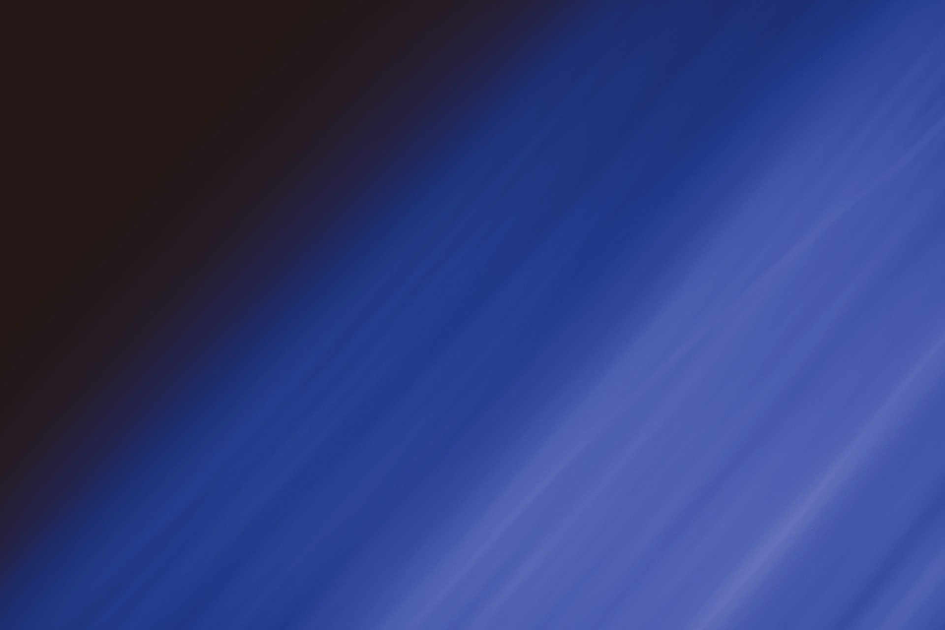 a blurry image of a blue and black background