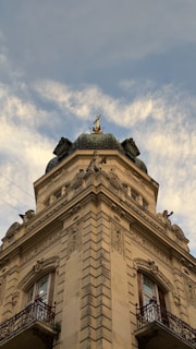 a tall building with a clock on the top of it