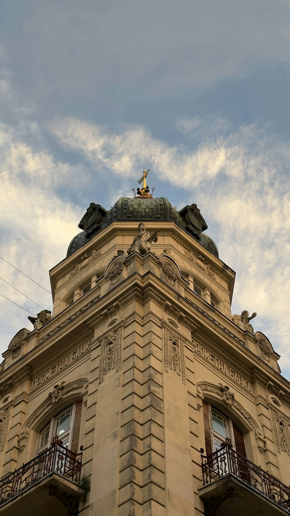 a tall building with a clock on the top of it