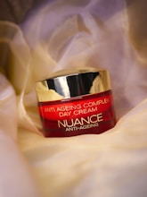 a close up of a jar of cream