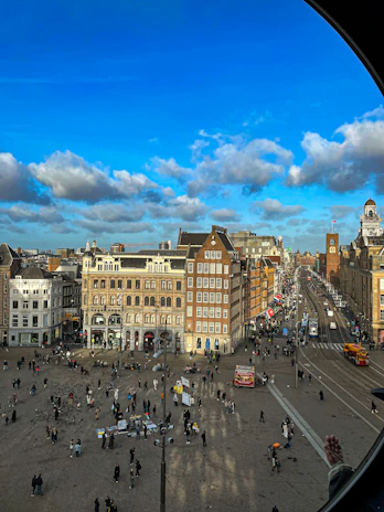 a view of a city from a round window