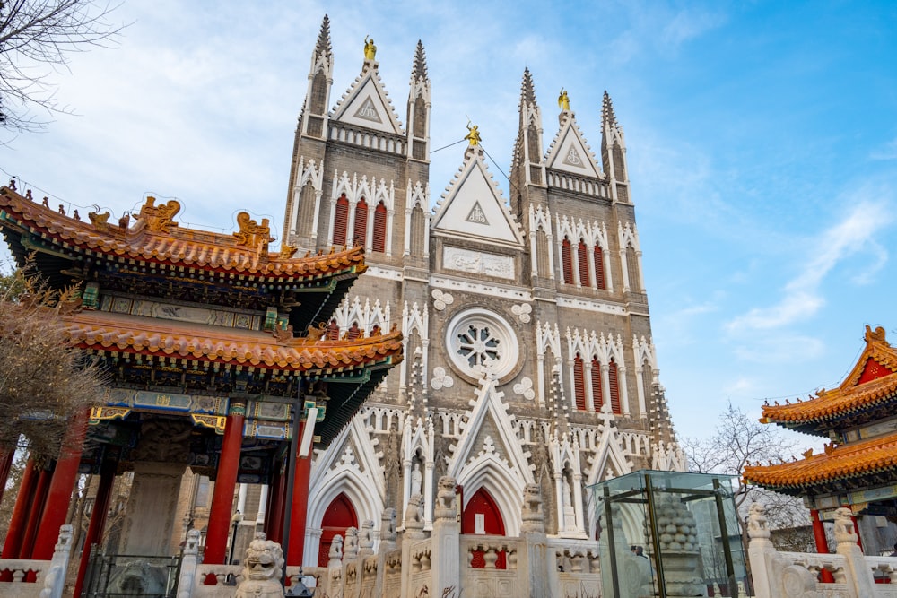 a large cathedral with a clock on the front of it