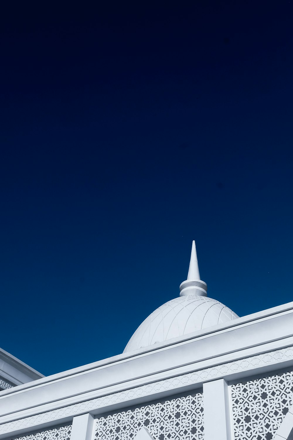 a white building with a dome on top of it