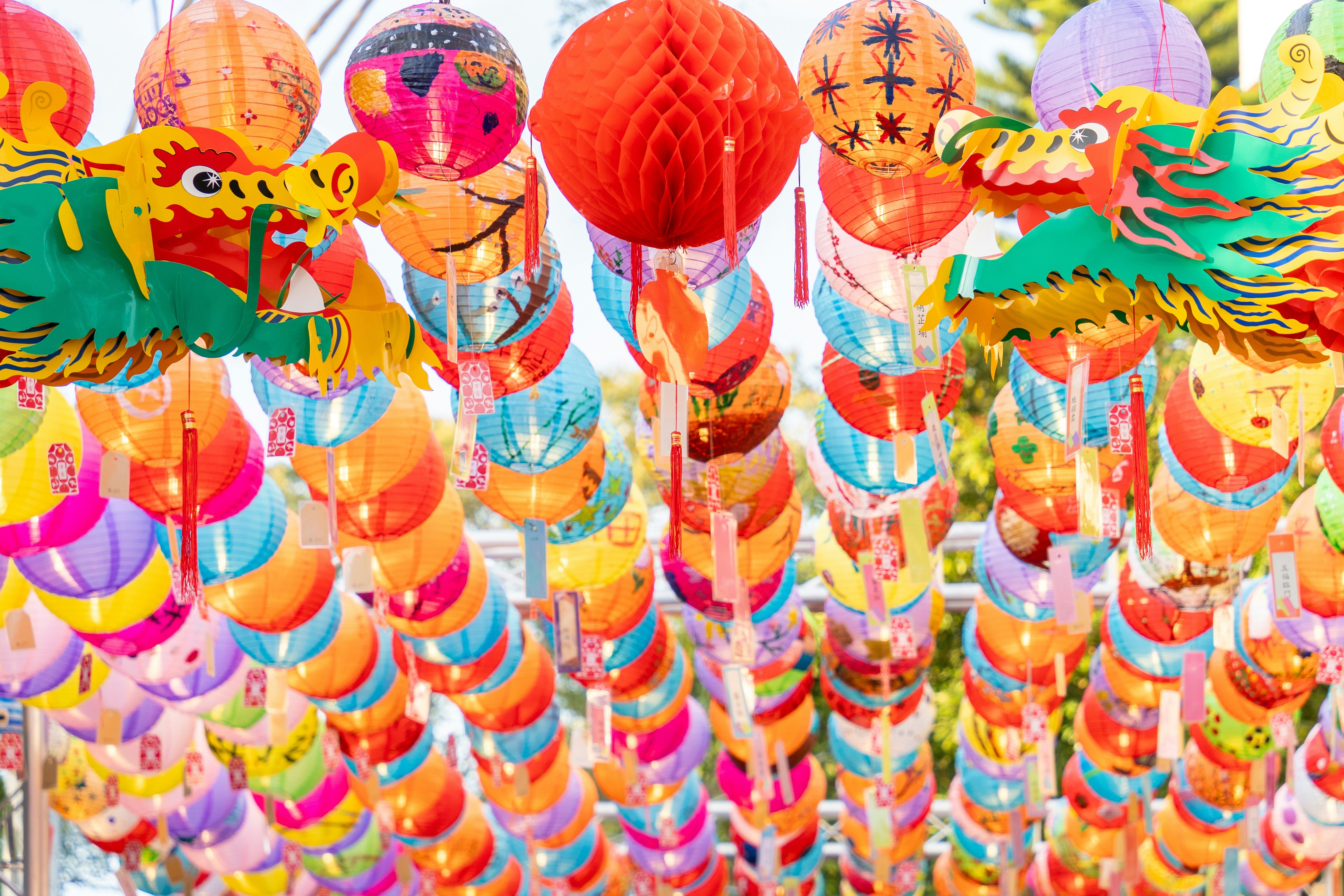 Colorful paper lanterns hanging overhead at a festival in Taiwan