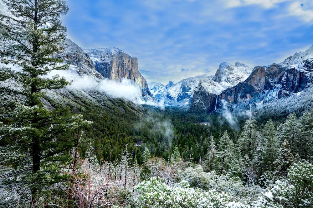 a view of a mountain range covered in snow