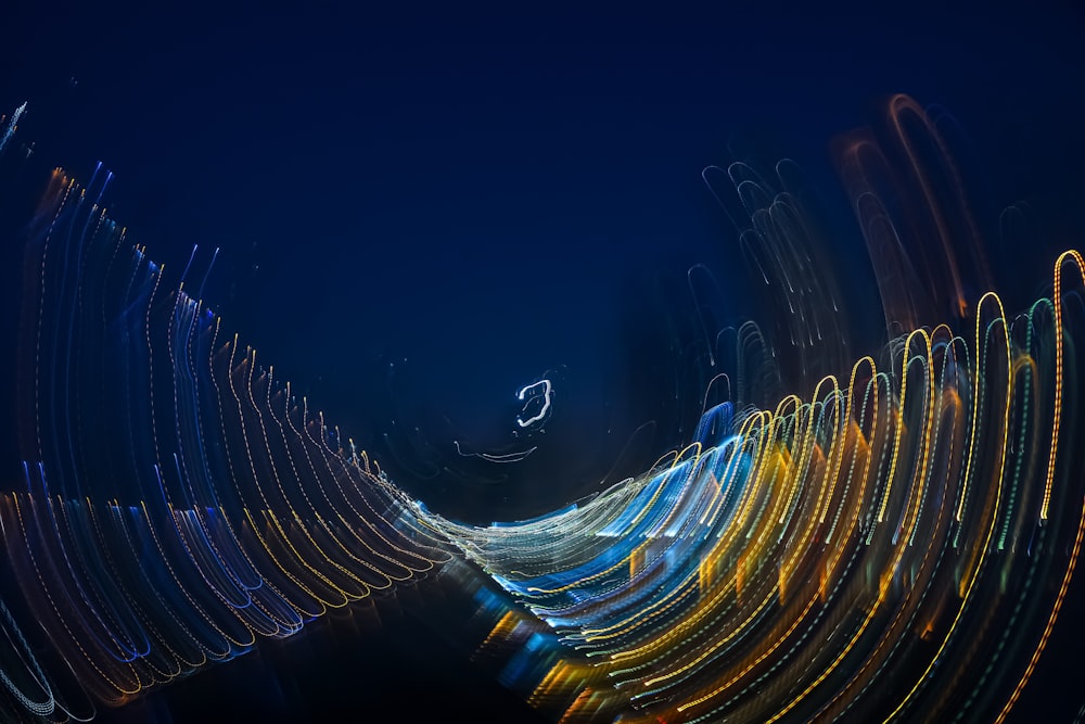 an abstract photo of a blue and yellow light