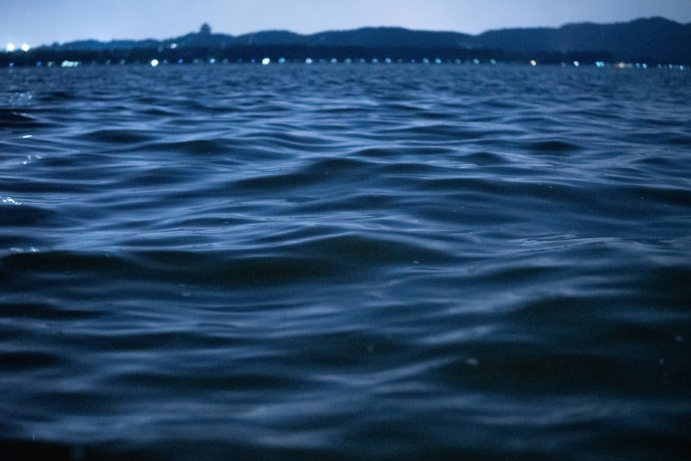a view of a body of water at night
