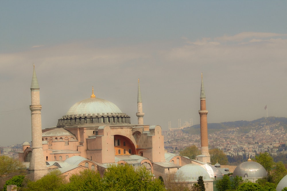 a view of a large building with two towers