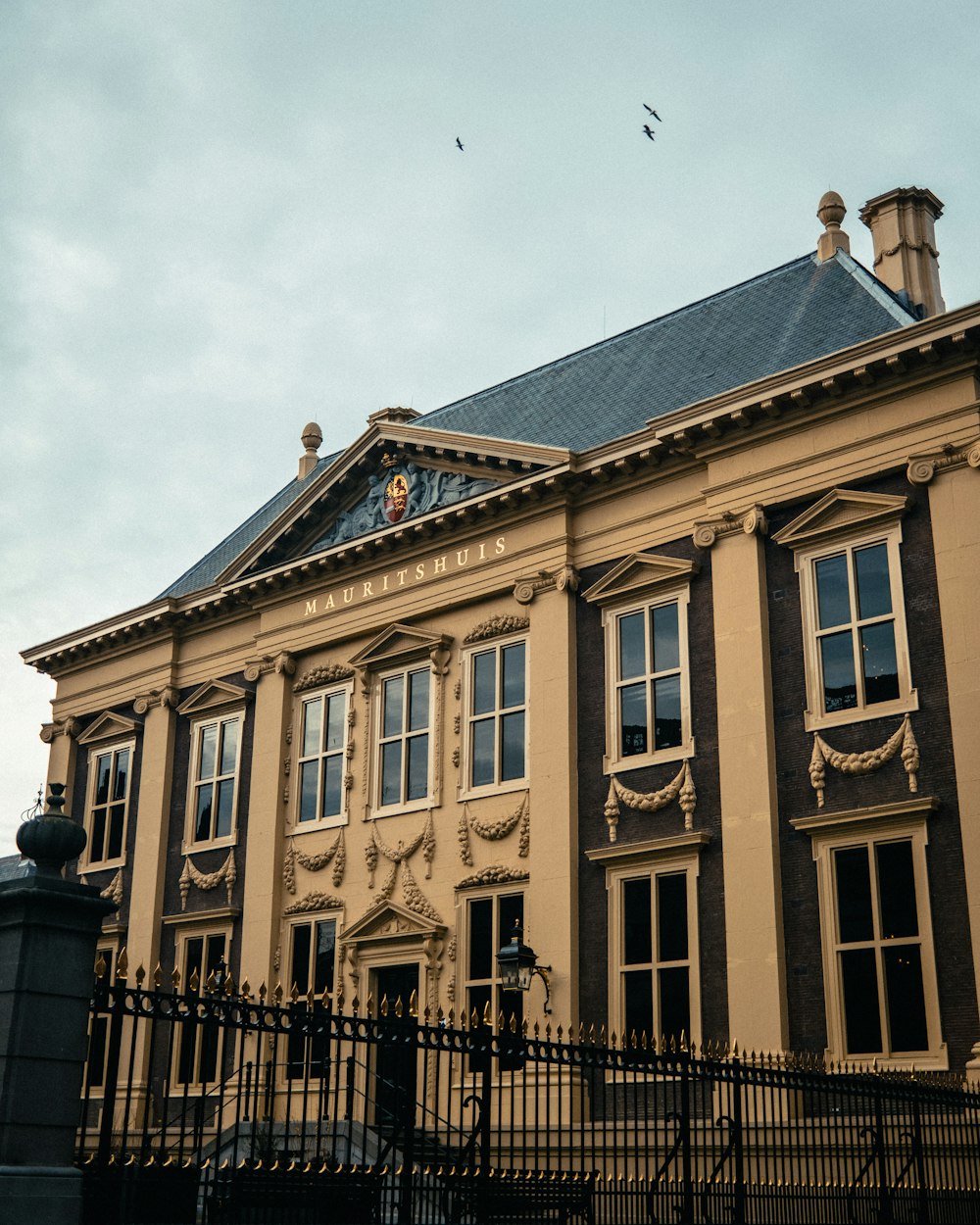 a large building with a clock on the top of it