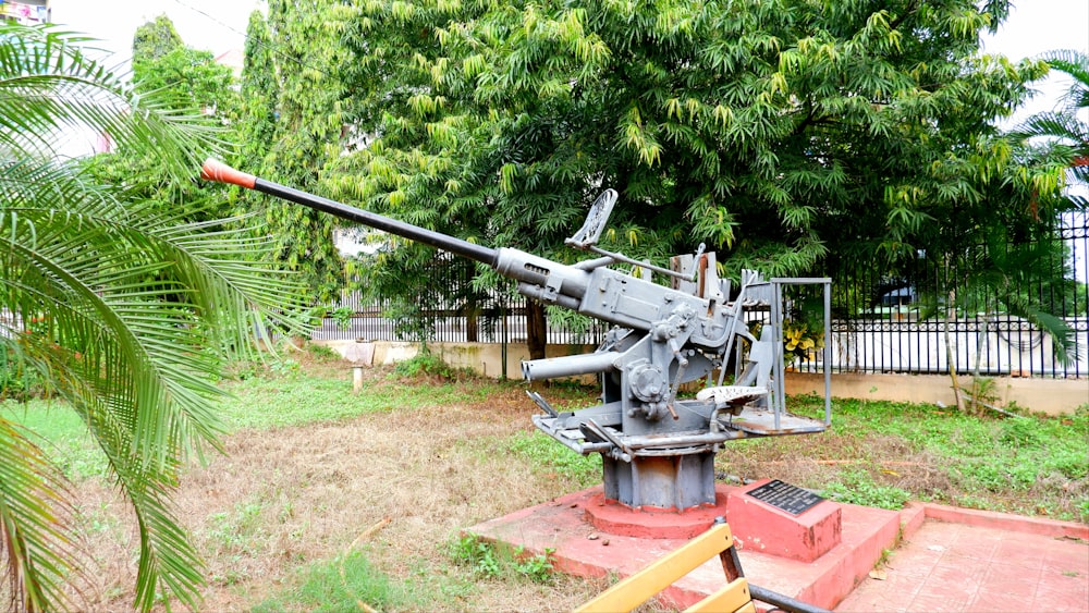 a large metal object sitting in the middle of a field