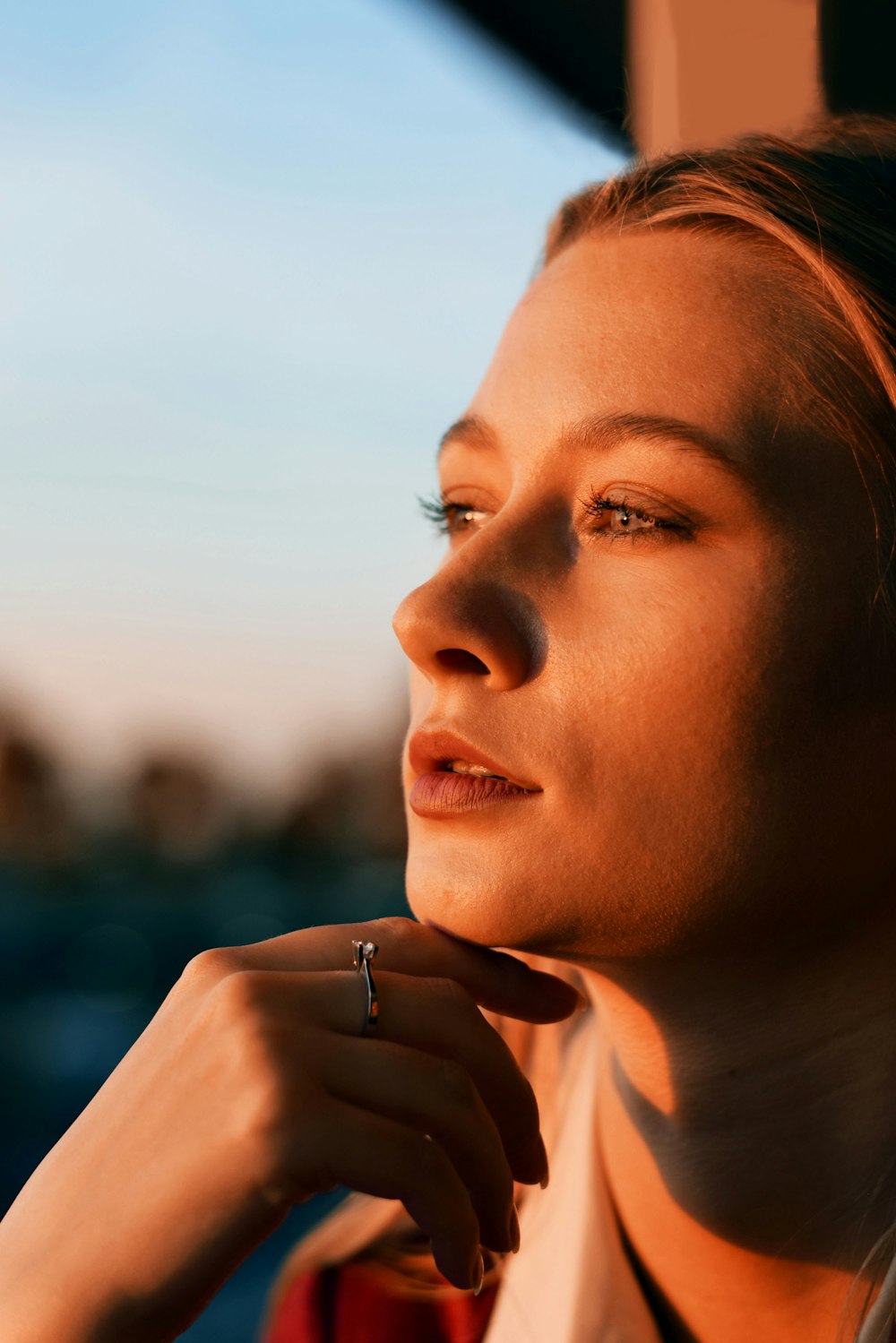 a woman with a ring on her finger