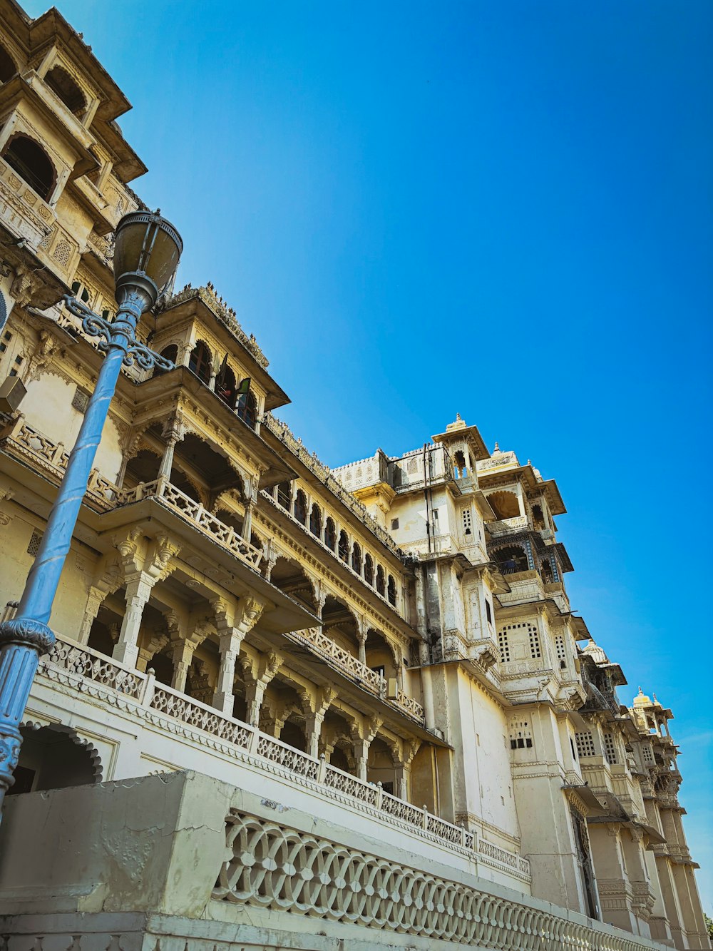 a large building with many balconies on top of it