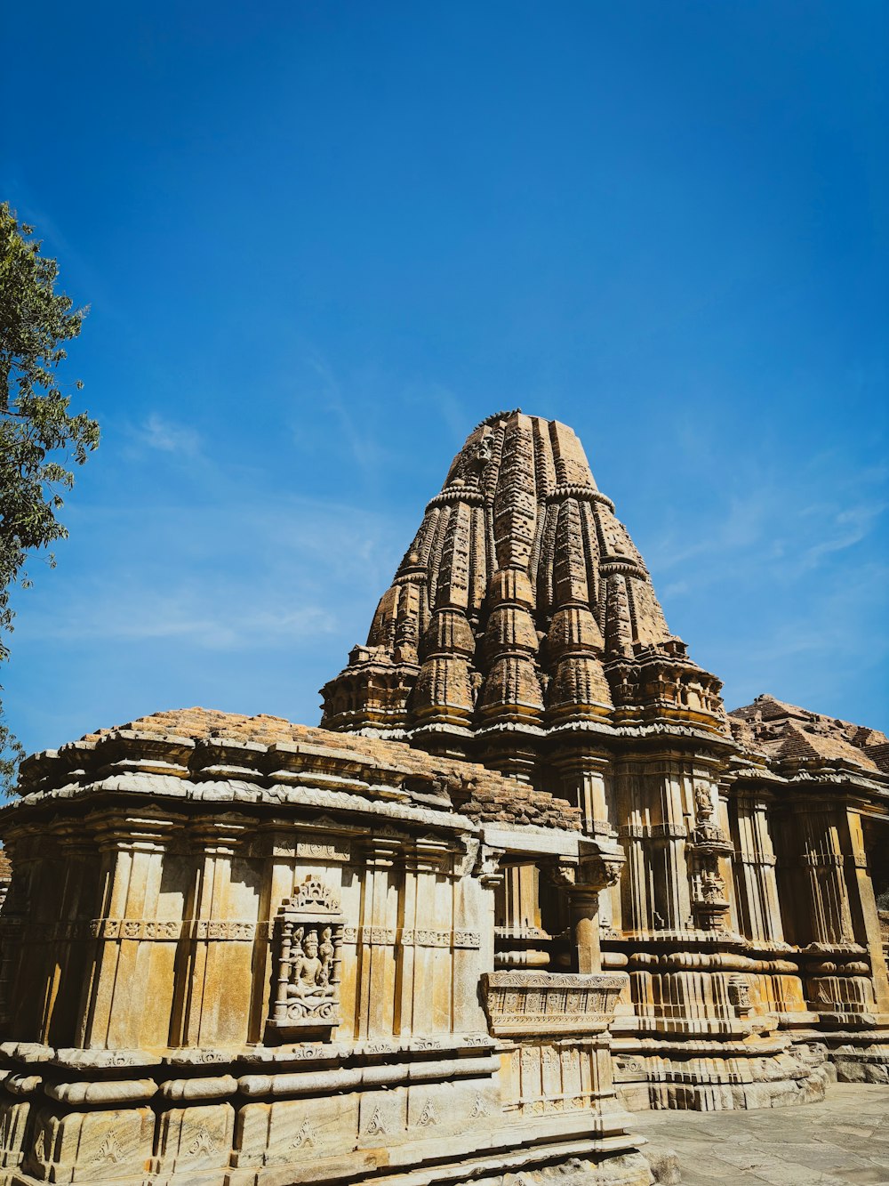 a large stone structure with a sky background