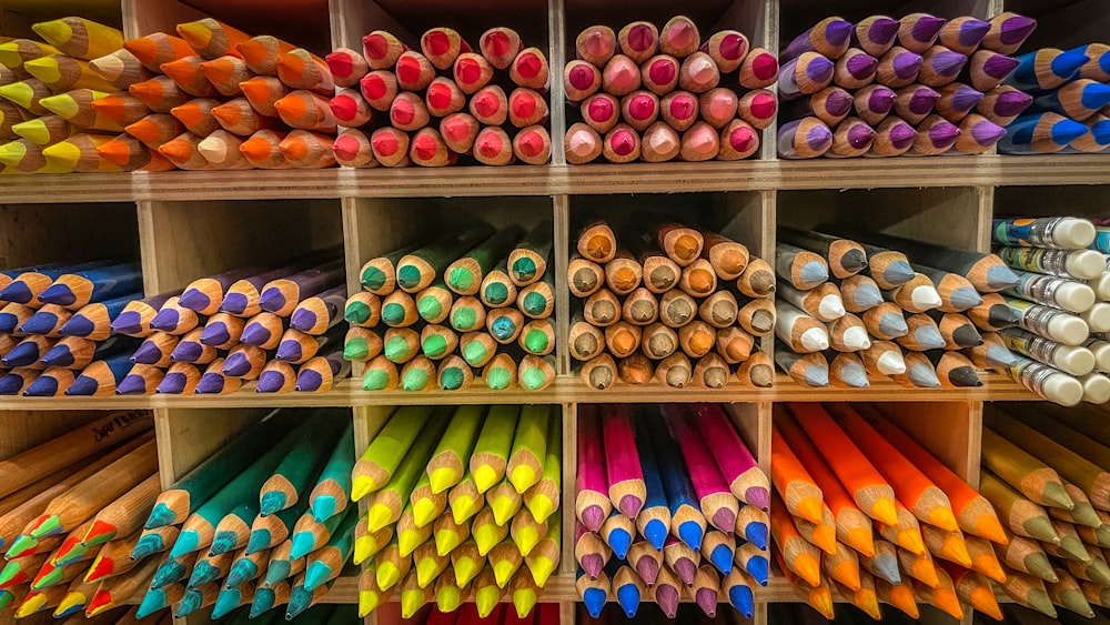 a display case filled with lots of different colored crayons