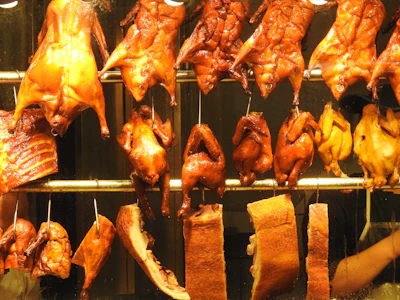 Traditional Cantonese cuisine dish plated in classic Chinese restaurant style