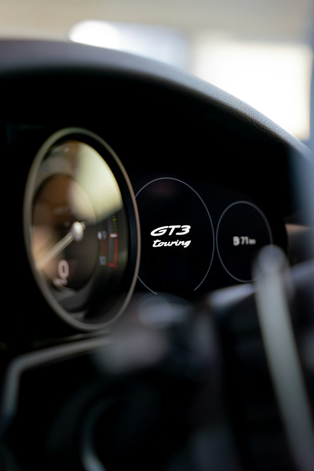 a close up of a car dashboard with a speedometer