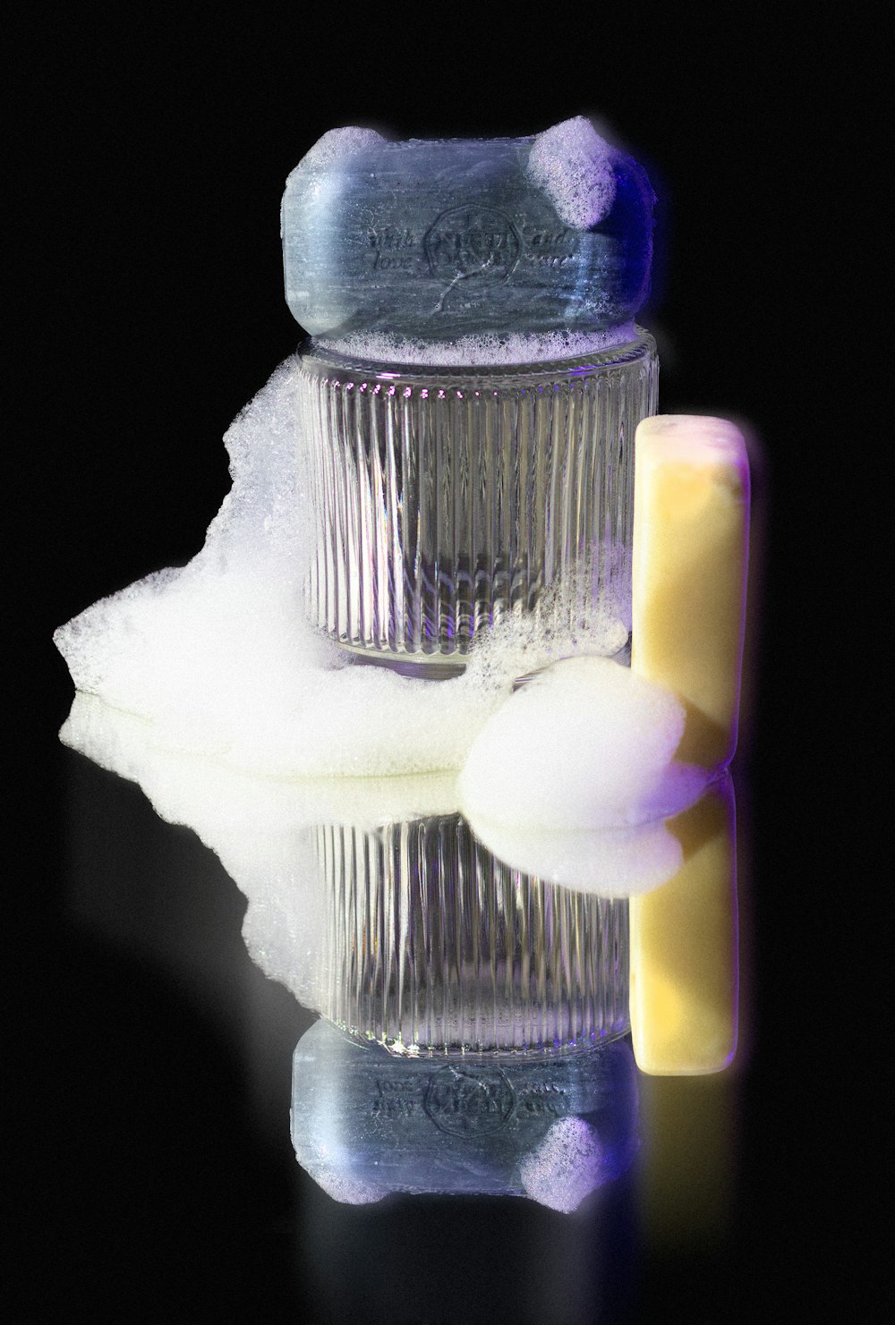 a couple of pieces of soap sitting on top of a table