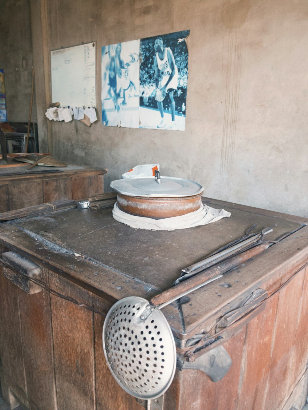 an old wooden cabinet with a sink on top of it