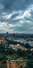 a view of a city with a cloudy sky