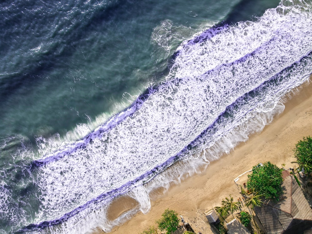 an aerial view of a beach and ocean