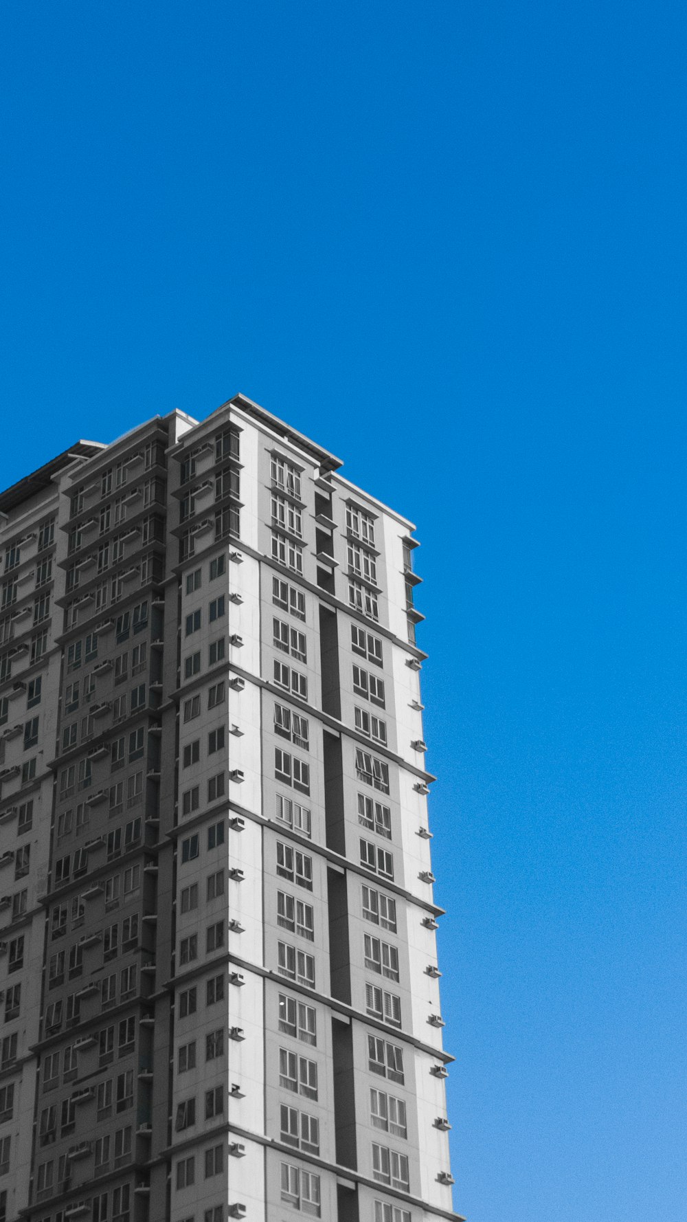 a tall building with a clock on the top of it