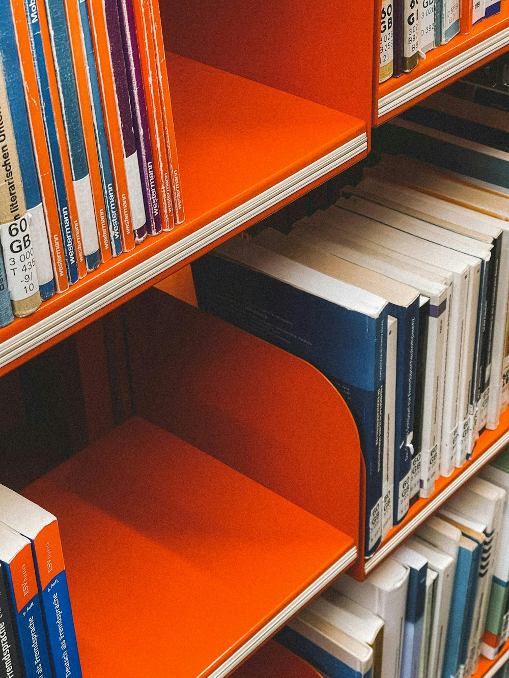 a book shelf filled with lots of books