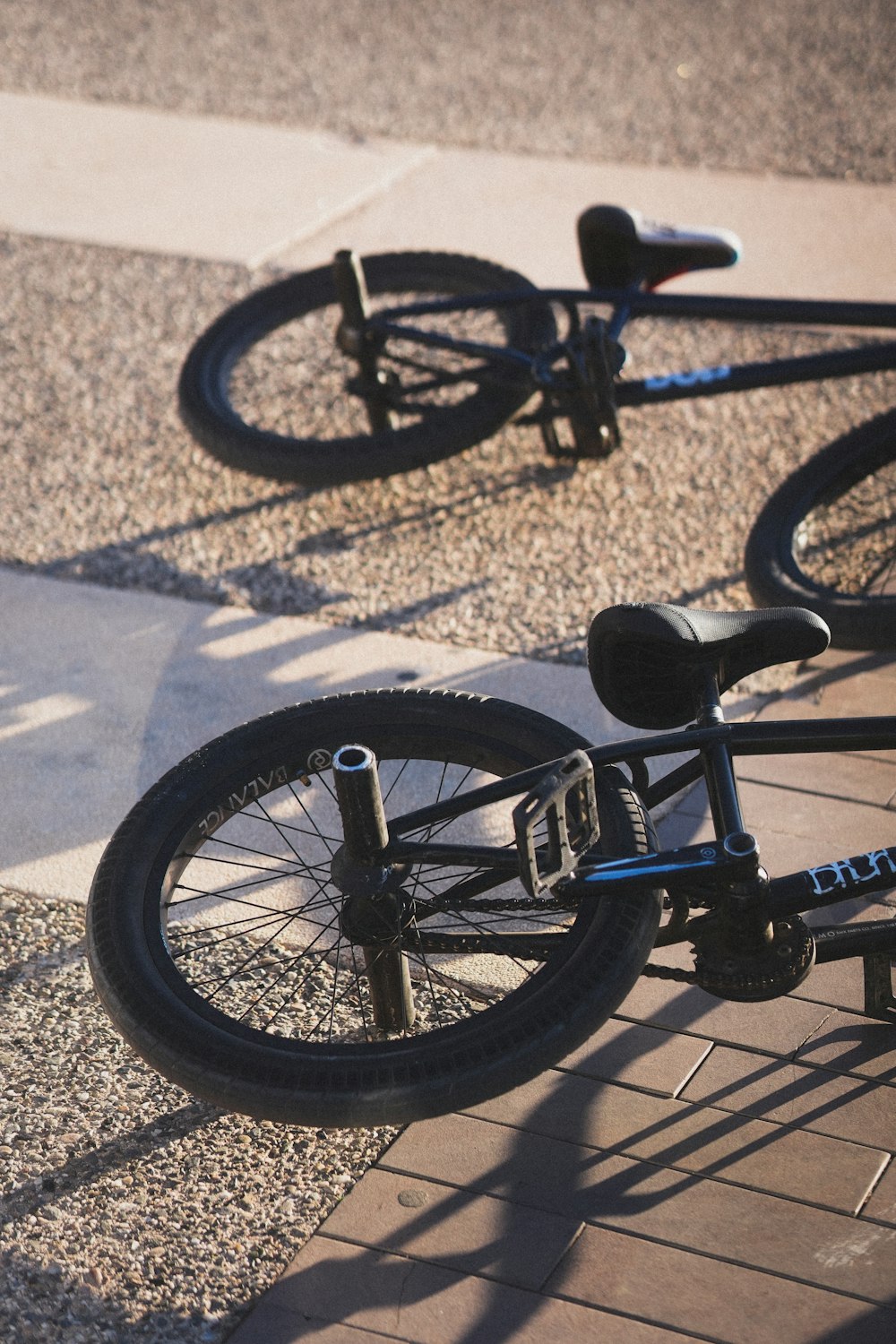 a bicycle parked on the side of the road