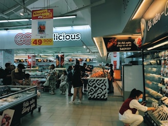 a group of people shopping in a store
