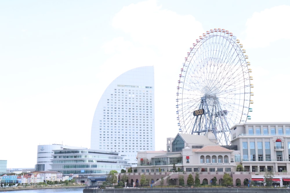 a ferris wheel in the middle of a city